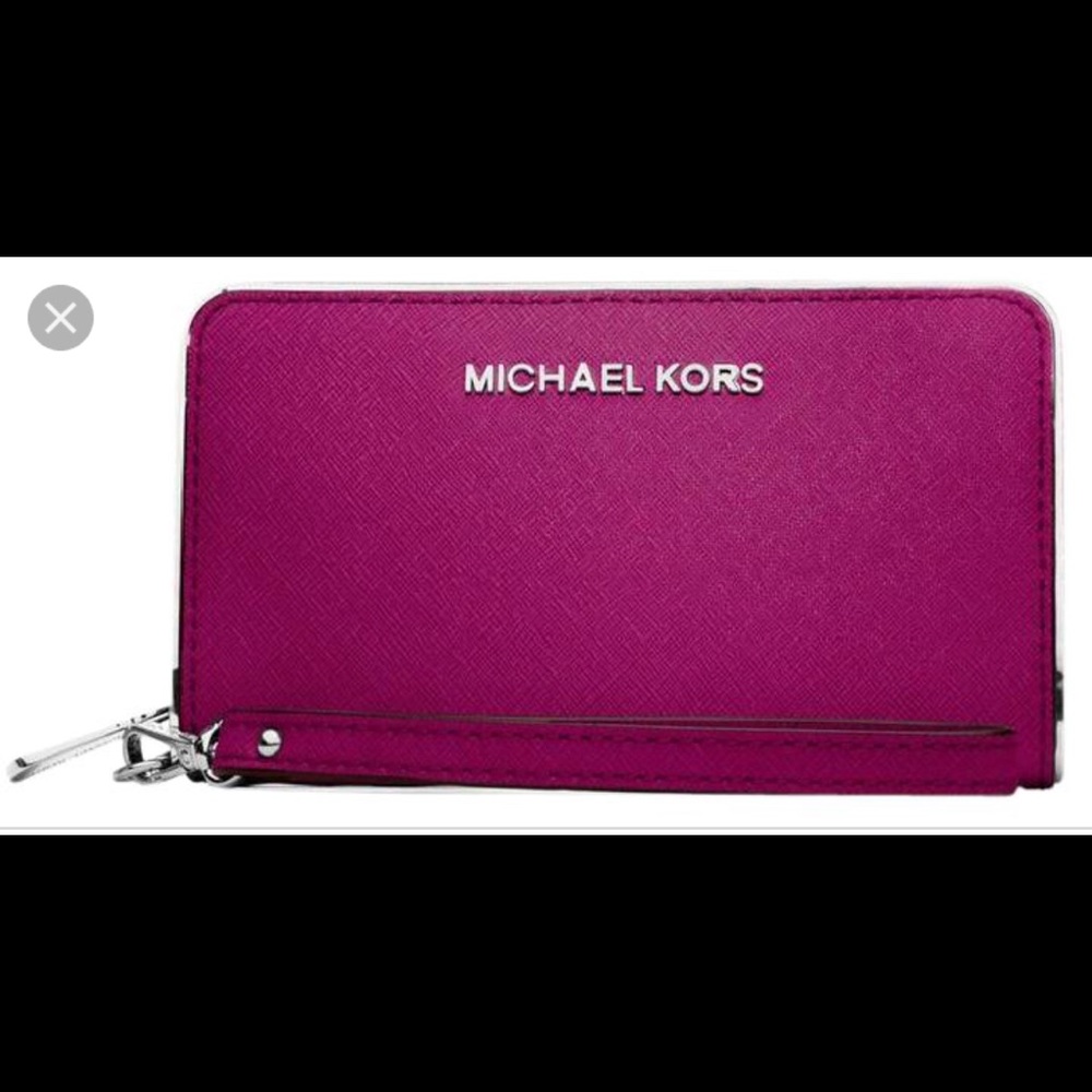 Micheal Kors phone wallet, fits iPhone 10,11,12,13,14 just regular size only.